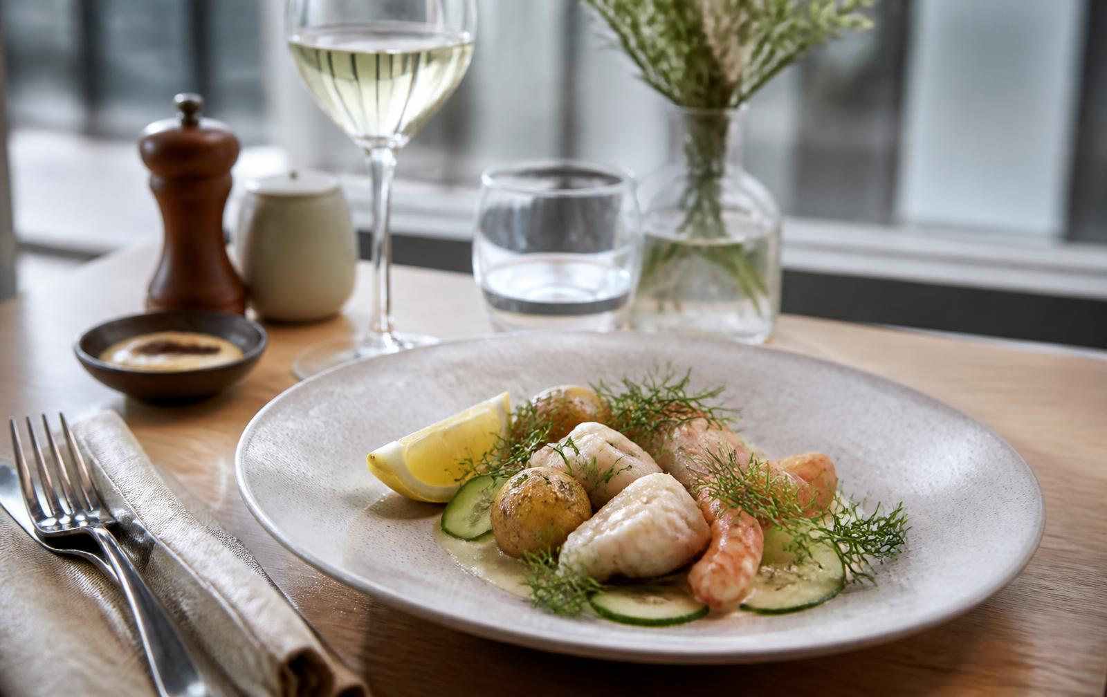 Oslo Design & Food Weekend — Nordic seafood dish on a restaurant table in warm daylight