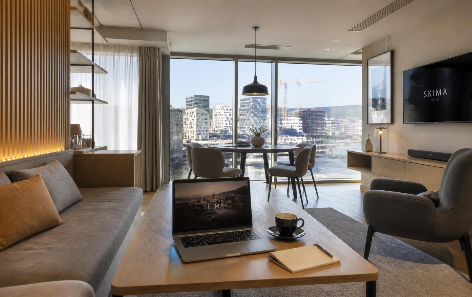 Oslo for Business Visitors — Bright contemporary Nordic hotel lounge with a harbour view